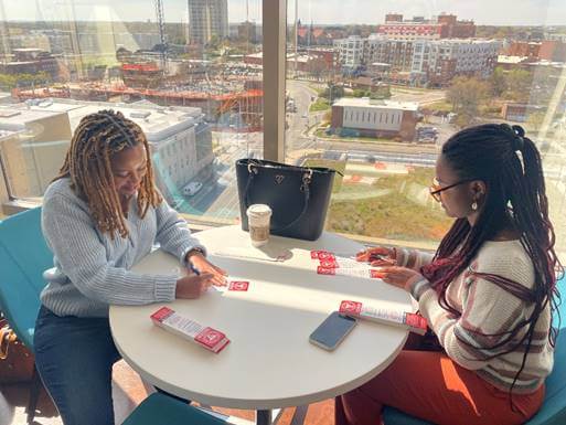 two people assembling overdose reversal kits