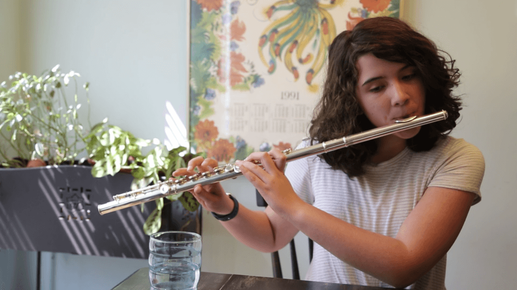 Olivia Sutton plays the flute