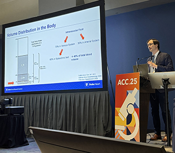Marat Fudim speaks at a podium while presenting a session during ACC25.