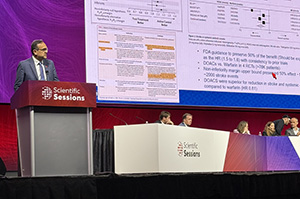 Manesh Patel dives deep into the science while standing at a podium on stage at AHA25