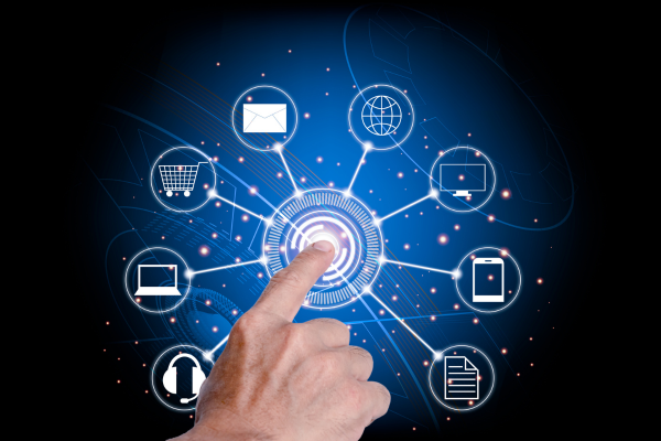 A finger presses on the center circle of an illustration of various icons representing digital channels, such as websites, phones, documents, headphones, shopping carts, etc.