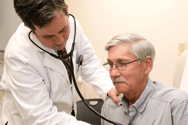 Dr. Hernandez with a patient