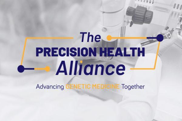 A scientist is shown using a microscope. The Precision Health Alliance logo is shown over the image.