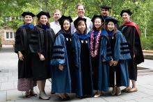 Biostatistics PhD fellows stand proudly with their mentors on graduation day.