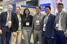 Past and present DCRI fellows pose for a photo with one of the program's mentors at a cardiology conference.