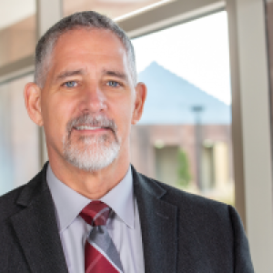 A headshot of David Wright